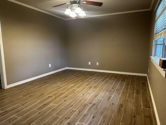 7165 Lewis Dr, Beaumont, TX 77708 - spare room with ceiling fan, dark wood-style flooring, baseboards, and ornamental molding