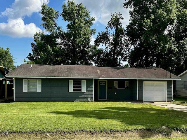 7165 Lewis Dr, Beaumont, TX 77708 - single story home featuring a garage, a front yard, and driveway