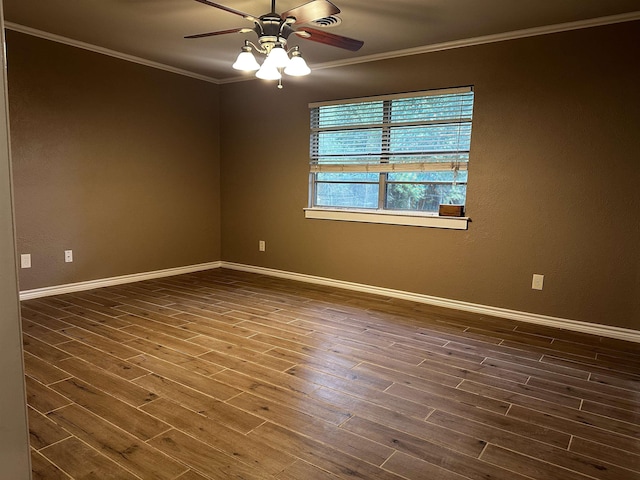 7165 Lewis Dr, Beaumont, TX 77708 - empty room featuring ceiling fan, crown molding, wood finished floors, and baseboards