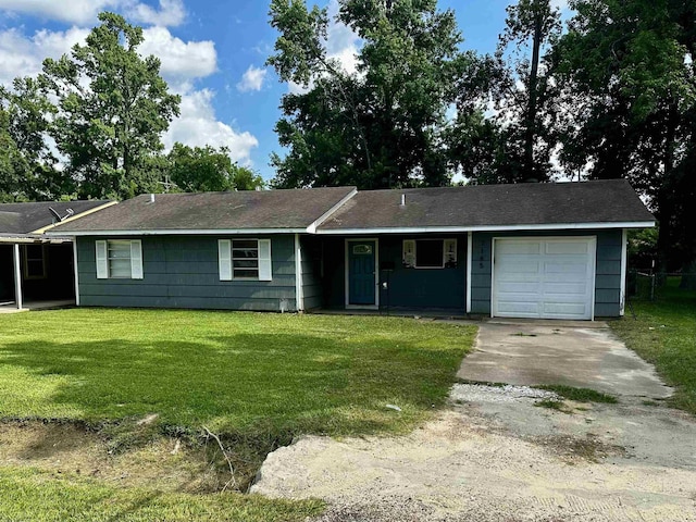 7165 Lewis Dr, Beaumont, TX 77708 - ranch-style house with concrete driveway, an attached garage, and a front lawn
