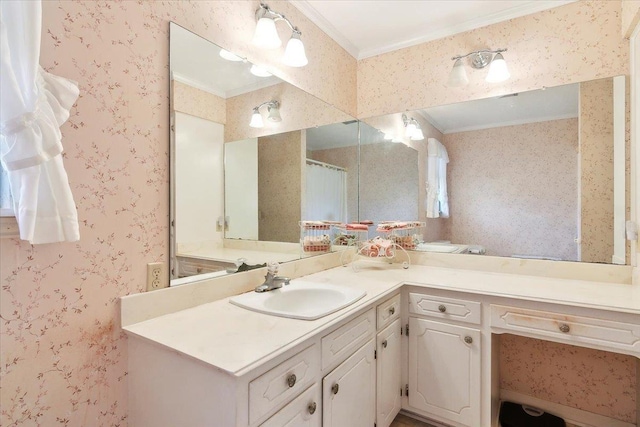 bathroom with crown molding and vanity