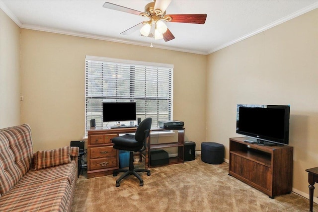 carpeted home office featuring ceiling fan and crown molding