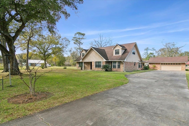 view of front of house with an outdoor structure and a front yard