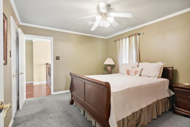 bedroom featuring ornamental molding, light carpet, and ceiling fan