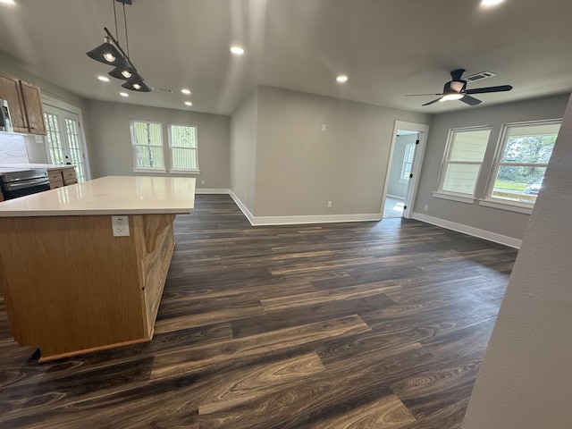 390 W Park St, Vidor, TX 77662 - kitchen with open floor plan, dark wood-style floors, baseboards, and recessed lighting