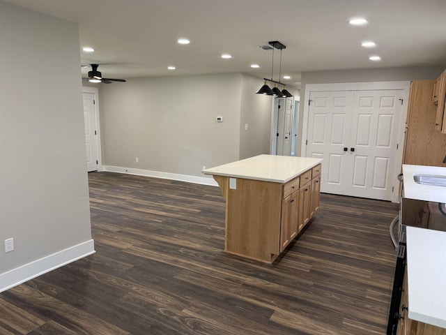 390 W Park St, Vidor, TX 77662 - kitchen with baseboards, recessed lighting, a ceiling fan, dark wood finished floors, and a sink