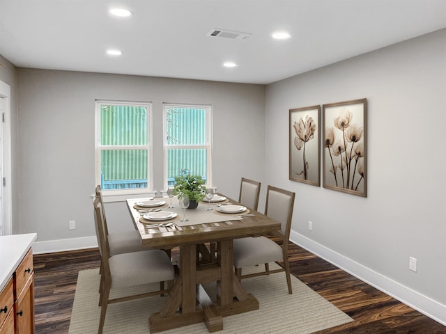390 W Park St, Vidor, TX 77662 - dining area with baseboards, dark wood-style flooring, and recessed lighting