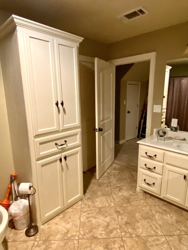 bathroom featuring vanity and tile patterned floors