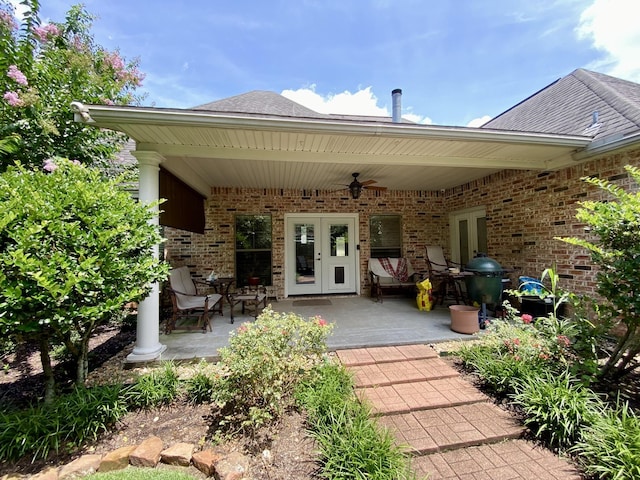 back of house with french doors, ceiling fan, and a patio area