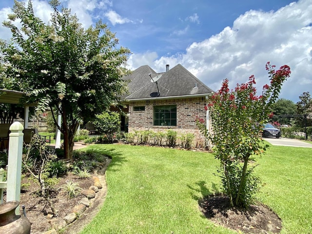 exterior space with a front lawn