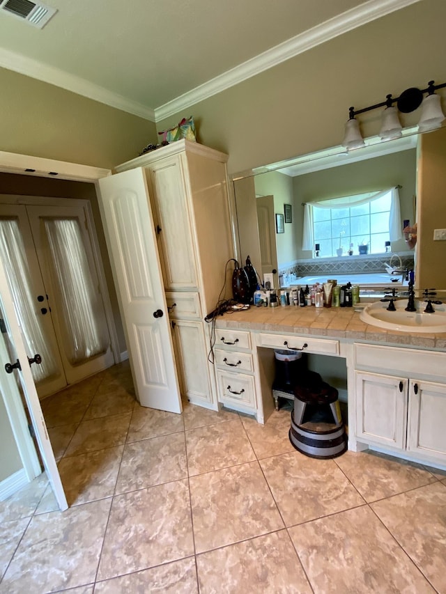 bathroom with french doors, vanity, tile patterned floors, and crown molding