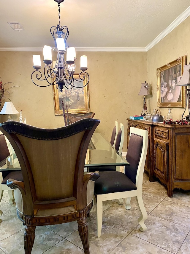 dining room featuring crown molding and an inviting chandelier