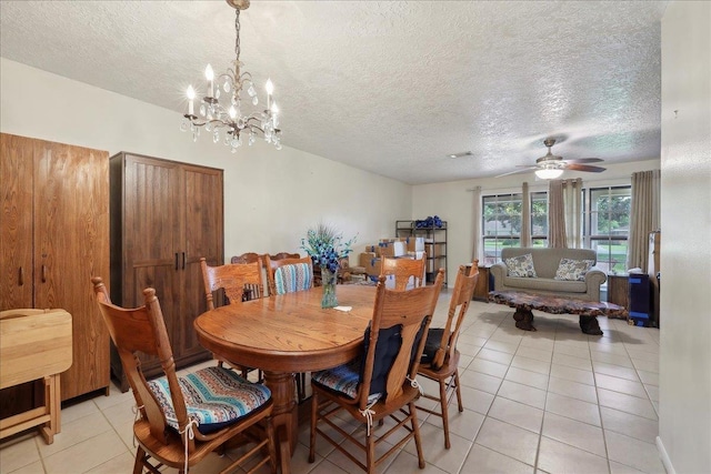 7760 Laurie Ln, Lumberton, TX 77657 - dining area featuring light tile patterned floors, a textured ceiling, a chandelier, and a ceiling fan