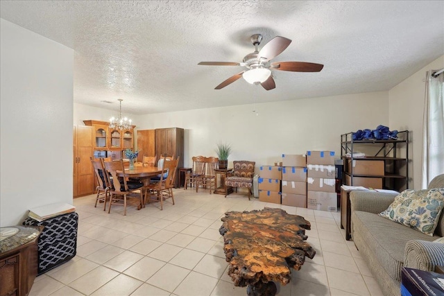 7760 Laurie Ln, Lumberton, TX 77657 - living room with light tile patterned flooring, a textured ceiling, a chandelier, and ceiling fan