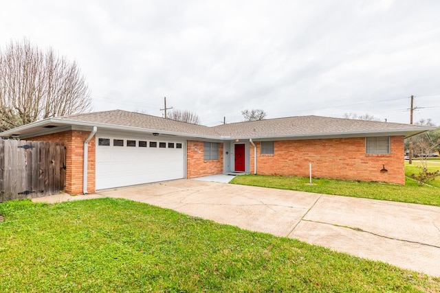 single story home with a front lawn and a garage