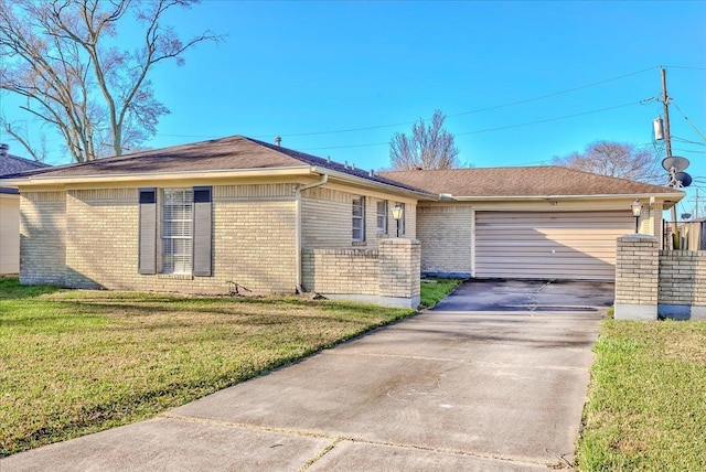 ranch-style house with a front yard, an attached garage, brick siding, and driveway