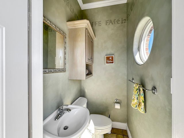 bathroom with sink, tile patterned floors, and toilet