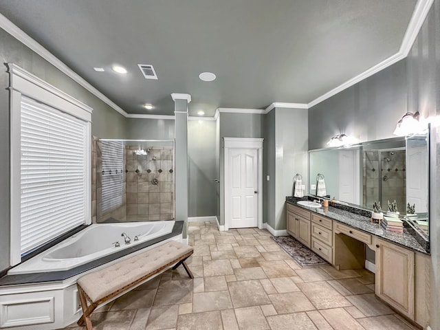 bathroom with ornamental molding, vanity, and independent shower and bath