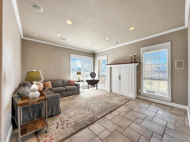 living room featuring crown molding and a wealth of natural light