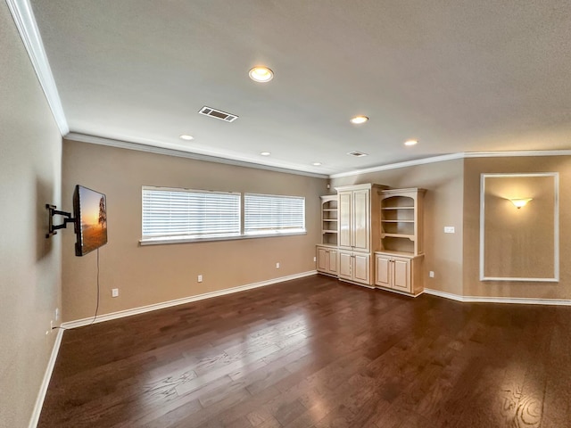 unfurnished living room featuring ornamental molding and dark hardwood / wood-style flooring