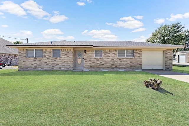 ranch-style house with a front yard and a garage