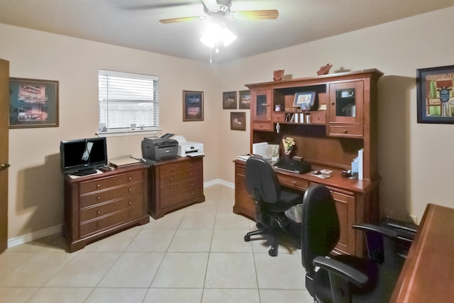 tiled home office with ceiling fan