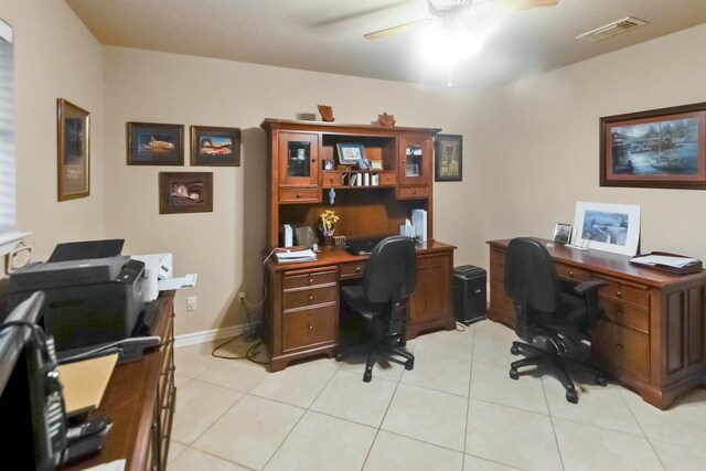 tiled office with ceiling fan