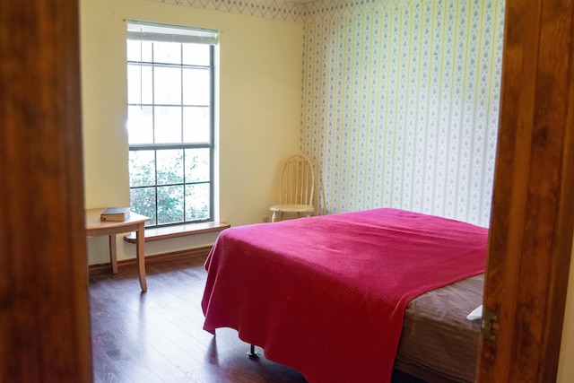 bedroom featuring hardwood / wood-style floors