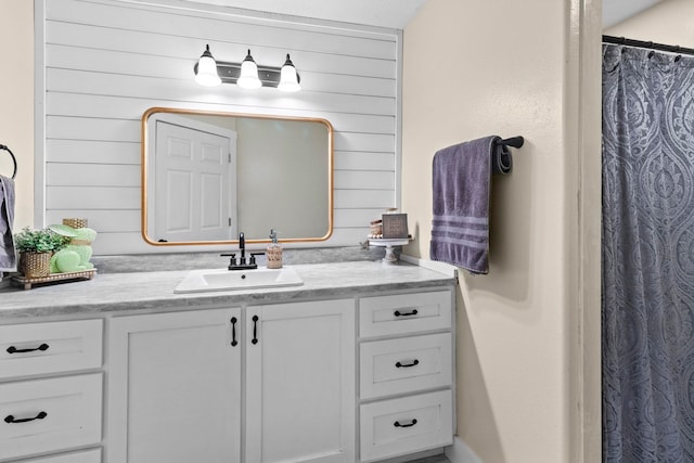 bathroom featuring vanity and a shower with curtain