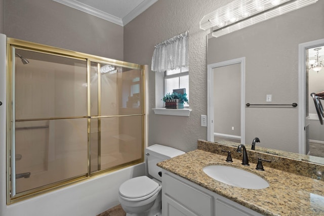 full bathroom with ornamental molding, a textured wall, toilet, bath / shower combo with glass door, and vanity