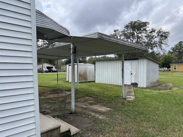 view of yard featuring an outbuilding and a carport