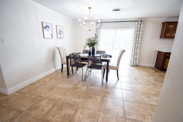 dining room with ornamental molding and a notable chandelier