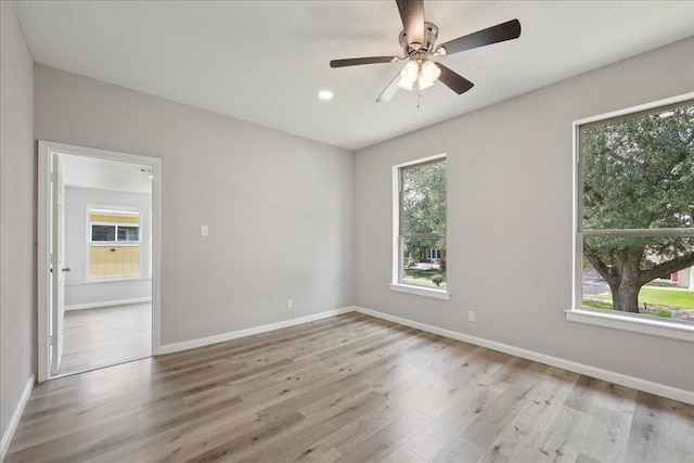 2033 Broadway St, Beaumont, TX 77702 - unfurnished room with wood finished floors, baseboards, a ceiling fan, and recessed lighting