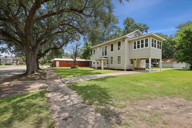 2033 Broadway St, Beaumont, TX 77702 - view of front facade featuring a front lawn