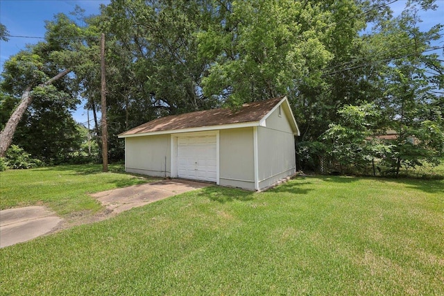 2033 Broadway St, Beaumont, TX 77702 - detached garage featuring concrete driveway