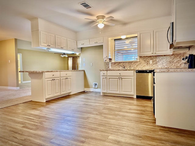 kitchen with ceiling fan, light hardwood / wood-style floors, white cabinetry, and stainless steel appliances