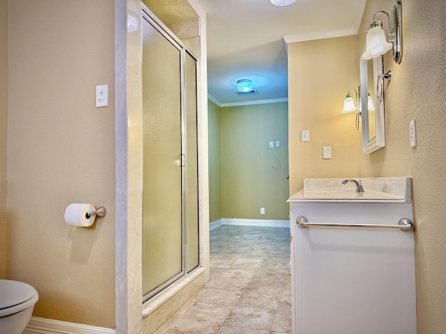 bathroom with vanity, ornamental molding, and walk in shower