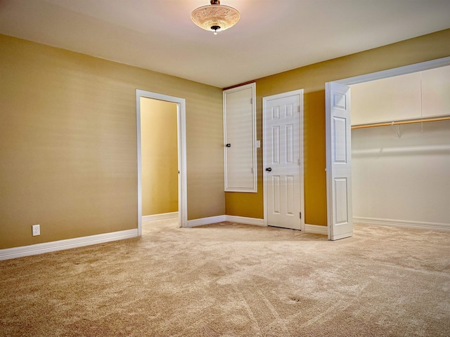 unfurnished bedroom featuring light colored carpet