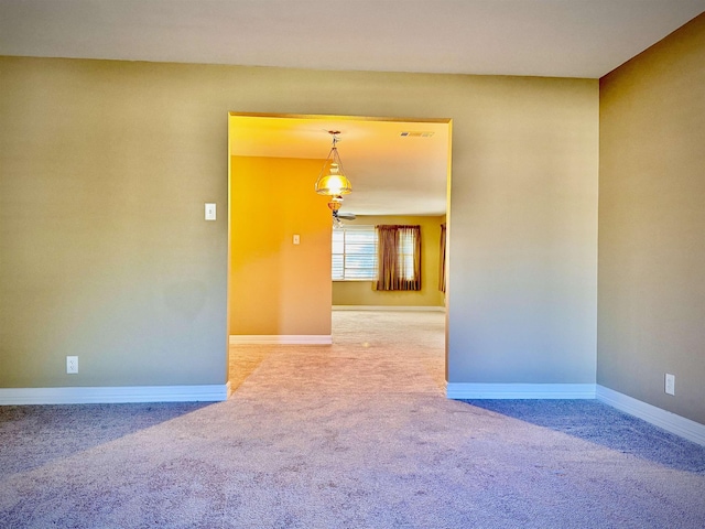 view of carpeted spare room