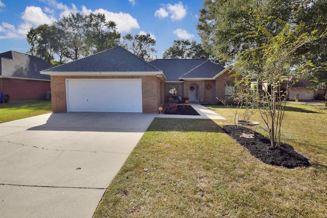 ranch-style house featuring a front yard and a garage