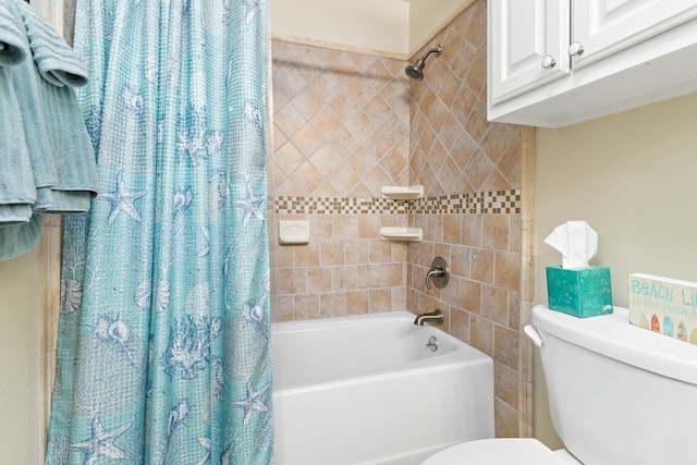 bathroom featuring toilet and shower / bath combo with shower curtain