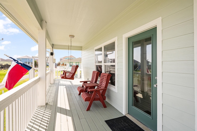 981 S S Gtwy, Crystal Beach, TX 77650 - wooden terrace featuring a residential view