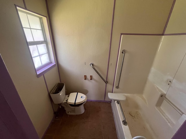 full bathroom with tile patterned floors, toilet, a shower, and baseboards