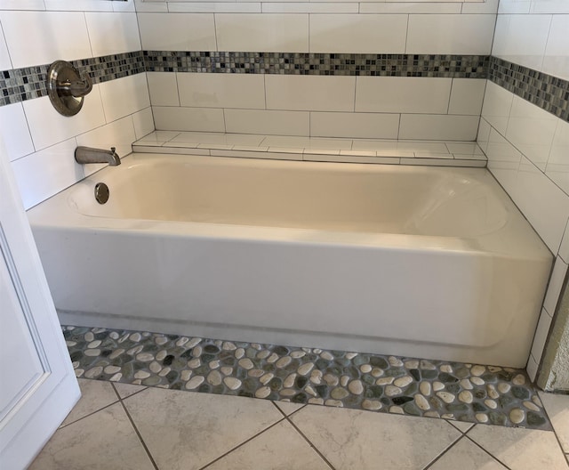 bathroom featuring a tub