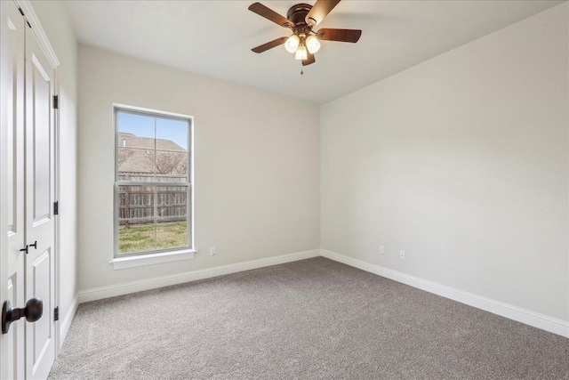 unfurnished room featuring carpet floors, a healthy amount of sunlight, and ceiling fan