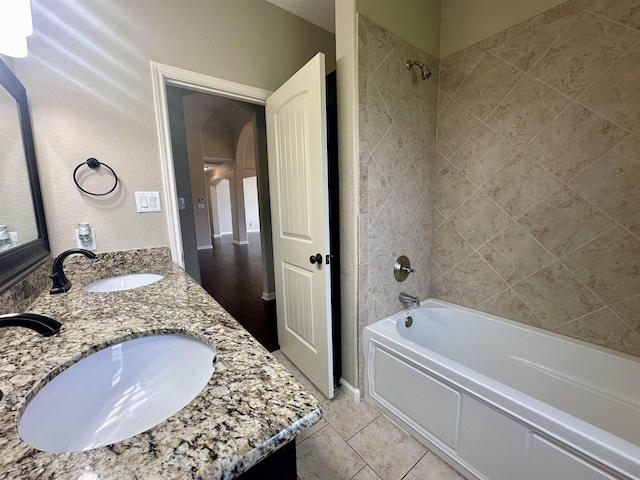 305 Tyler Dr, Bridge City, TX 77630 - full bath with bathtub / shower combination, double vanity, and tile patterned flooring
