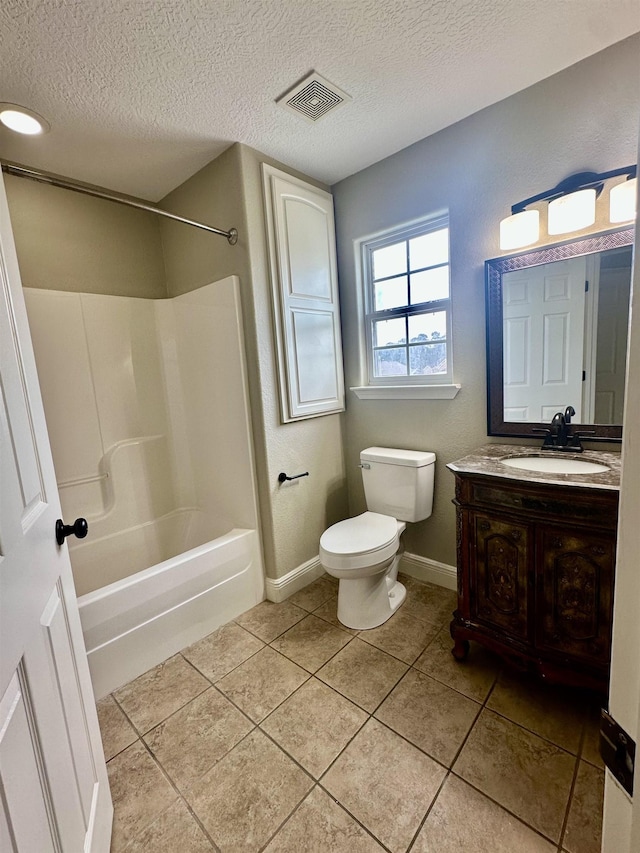305 Tyler Dr, Bridge City, TX 77630 - bathroom with toilet, a textured ceiling, tile patterned floors, vanity, and baseboards