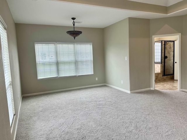 305 Tyler Dr, Bridge City, TX 77630 - empty room featuring carpet floors, healthy amount of natural light, and baseboards