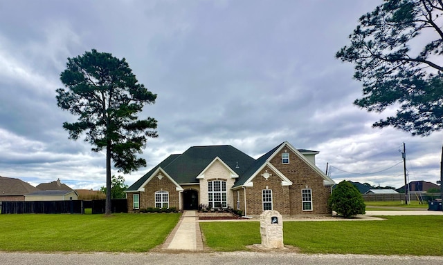 305 Tyler Dr, Bridge City, TX 77630 - view of front of home with brick siding
