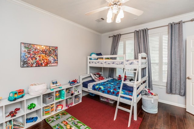 bedroom with ceiling fan, dark hardwood / wood-style floors, and ornamental molding